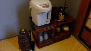 Since there are no shelves or benches in a tatami room, tea set is kept in a small cabinet in the corner