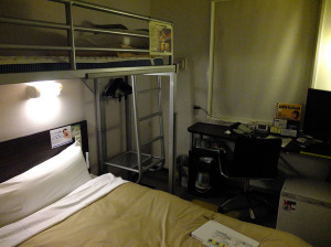 Superhotel's signature bed + upper bunk